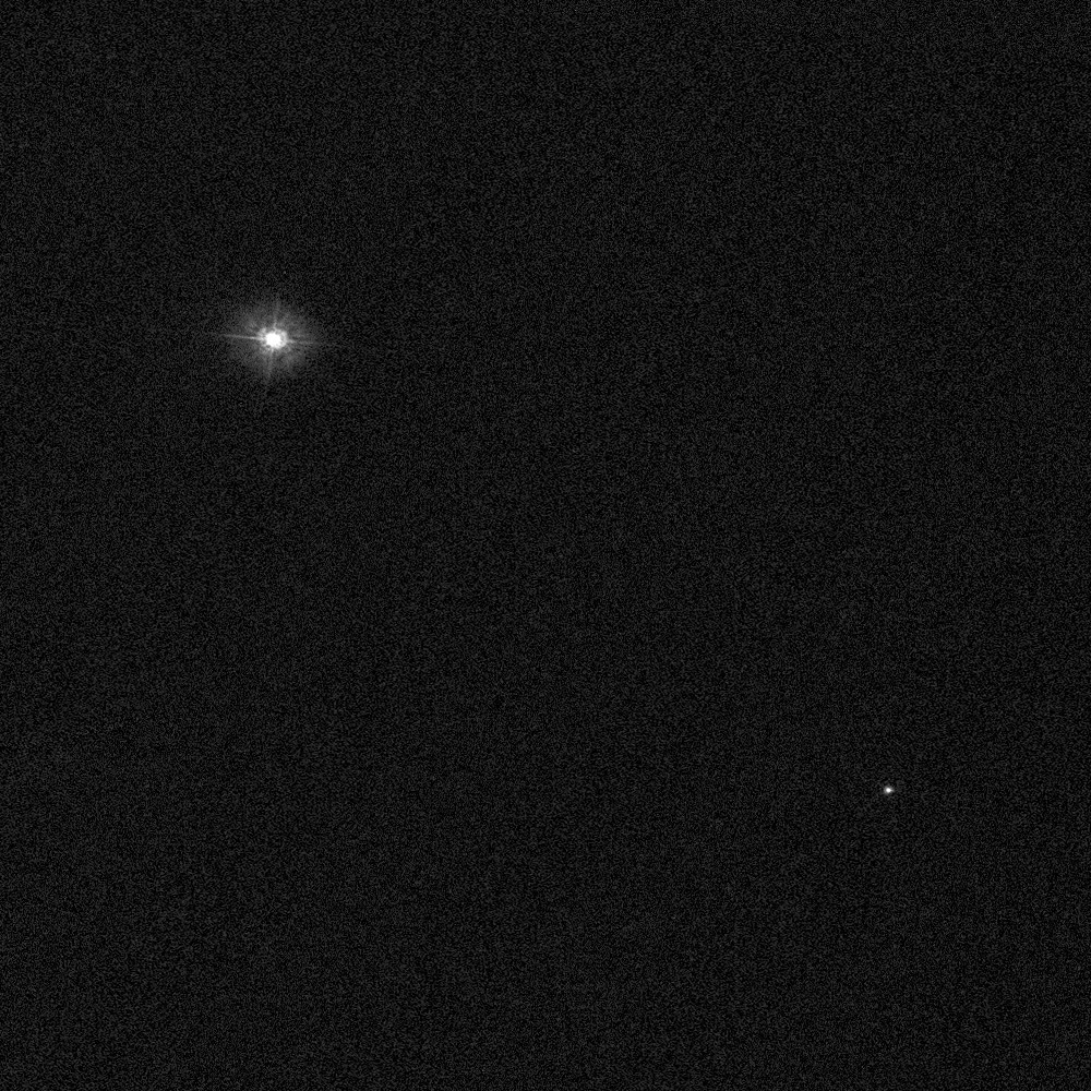 A Hubble Space Telescope view of the Polaris system, with the North Star, Polaris A, as the bright star at upper left and its faint companion Polaris B as the small dot at lower right.